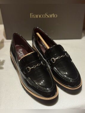 Franco Sarto Women's Colette Bit Loafers
featuring a glossy black Patent leather